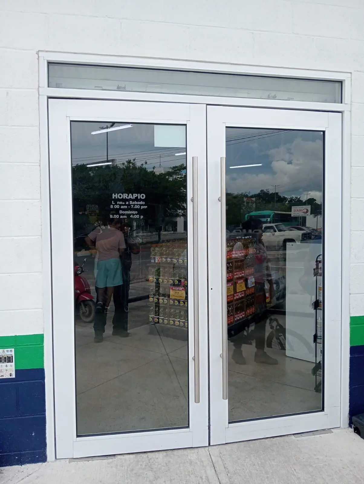 Glass entrance doors — commercial storefront installation