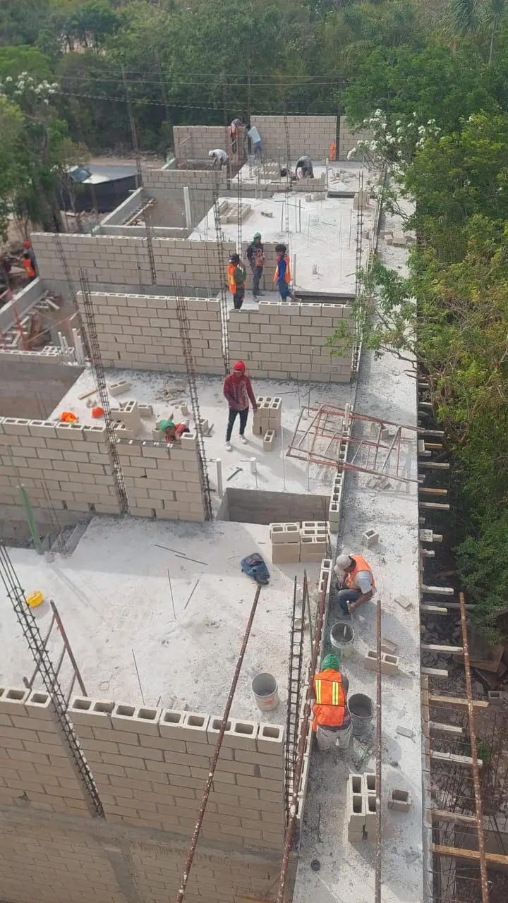 Residential construction in progress — block walls and reinforcement Playa del Carmen