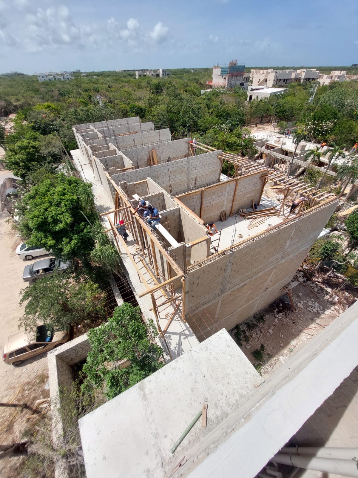 Multi-story residential building under construction — Riviera Maya